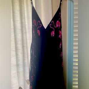 Loose harem jumpsuit with flamingo edge.  Worn once.